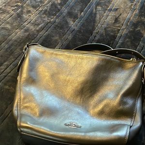 NWOT Coach large black refined leather dufflette bag.